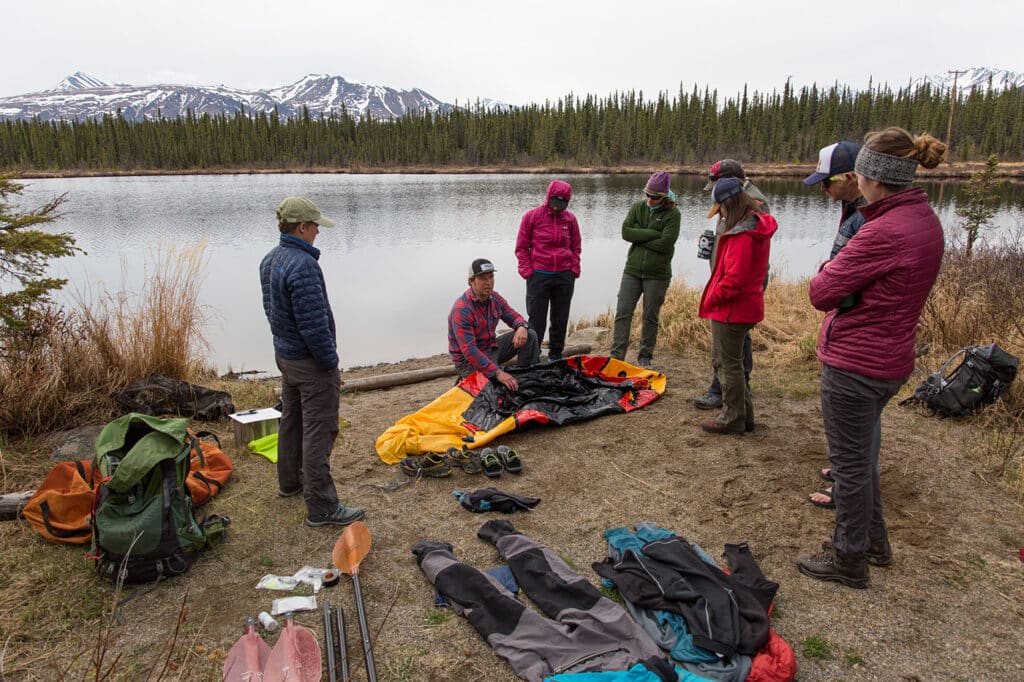 group watching how to pack for a trip